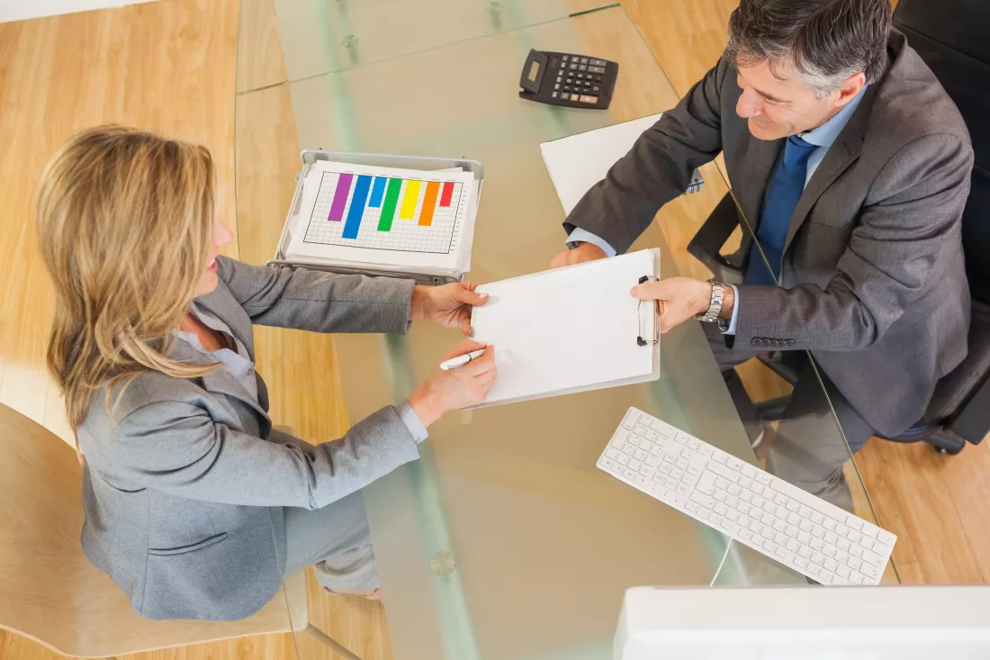 two-business-people-negociating-office